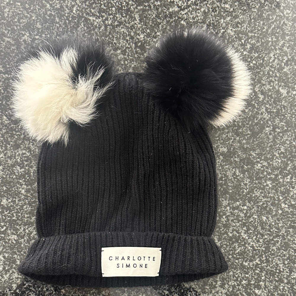 Charlotte Simone 100% cashmere hat with fox fur pompoms. Black and cream.